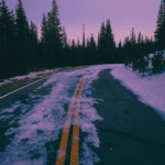 de-icing spray on snowy road